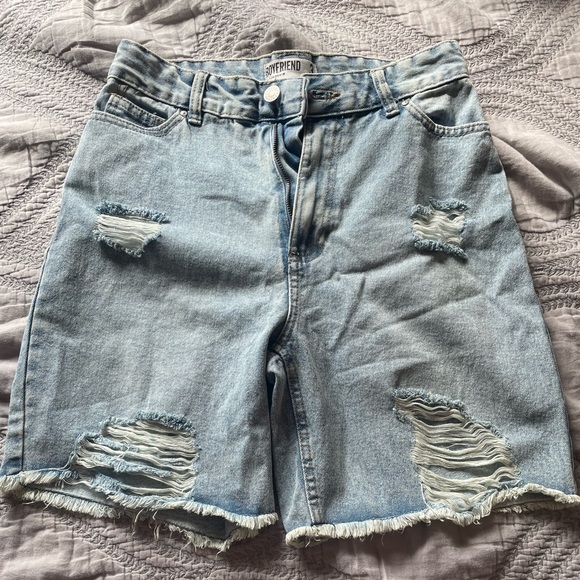 light blue jean shorts, torn fabric - Picture 1 of 3